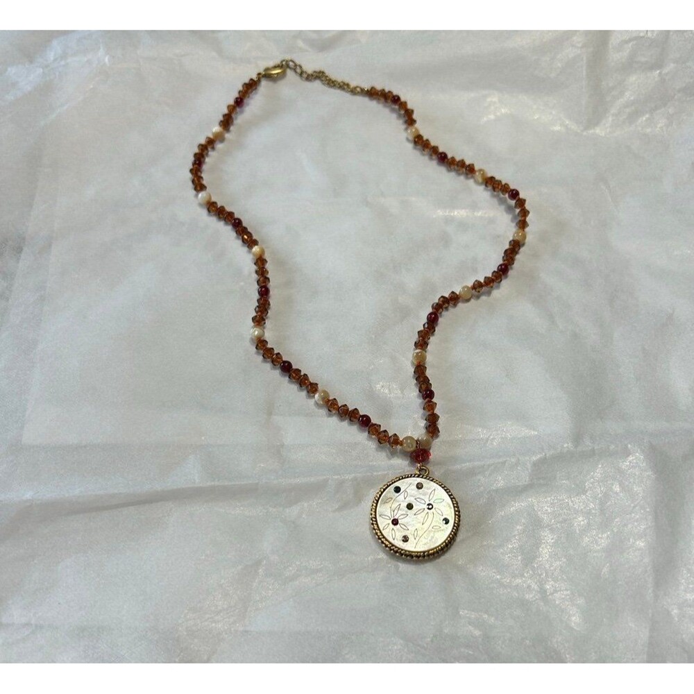Elegant Brown Beaded Necklace with a Mother of Pearl and colorful stone pendant